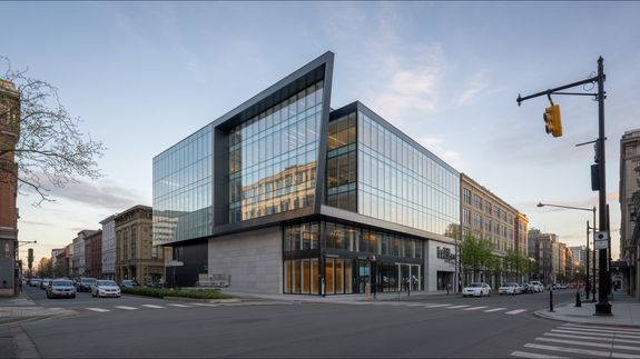 Male constructor drawing draft on paper roll