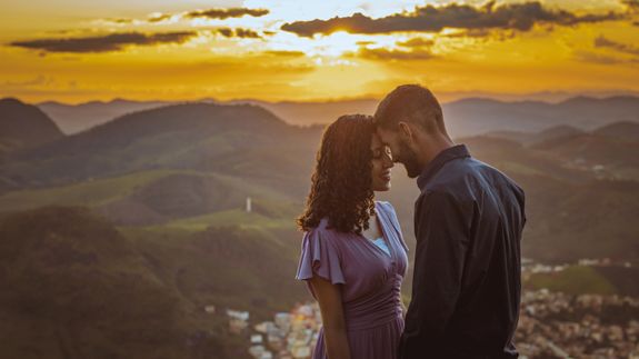 A bride signing her wedding vows at a ceremony