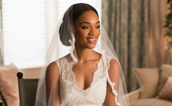 Shallow Focus Photography of Woman Wearing Blue and Gold Dress