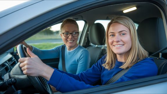 closeup photo of black analog speedometer