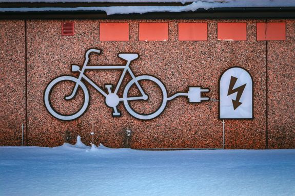Images of a Bicycle and Urban Charger on Wall