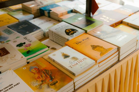 A table with many books on it