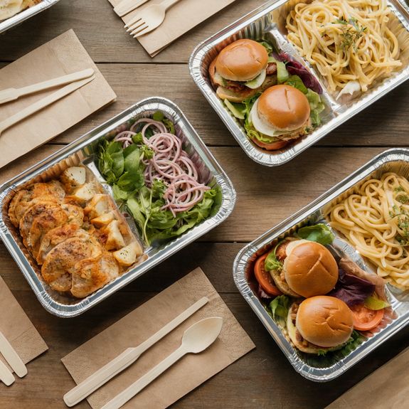 A Person Preparing a Charcuterie Board