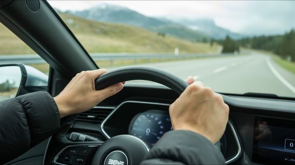 Aerial Photography of Blue Car on Road