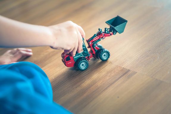 Red and Black Plastic Toy Car