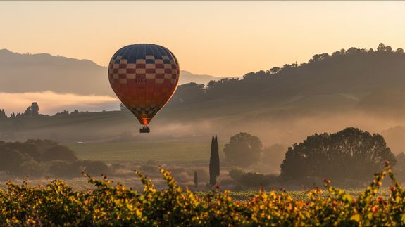 open sign hanging on physical storefront