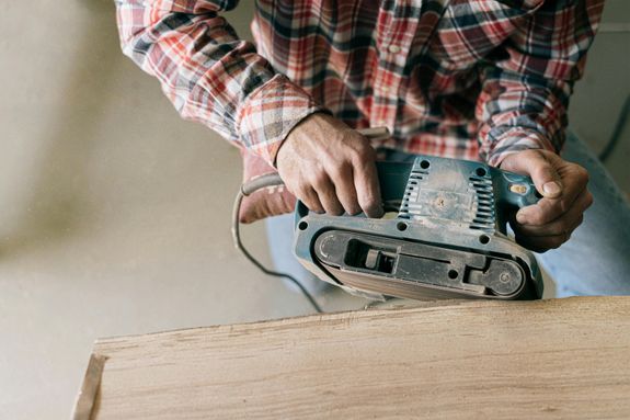 Person Holding Gray and Black Cassette Player