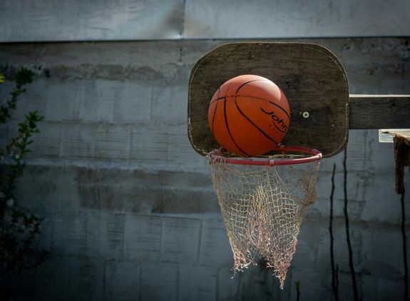 Close-up of a Ball and Basketball Court