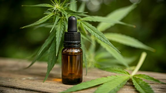 Woman Using CBD Balm