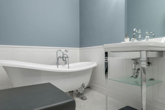Luxurious bathroom featuring a clawfoot tub and sleek design. Contemporary and spacious.