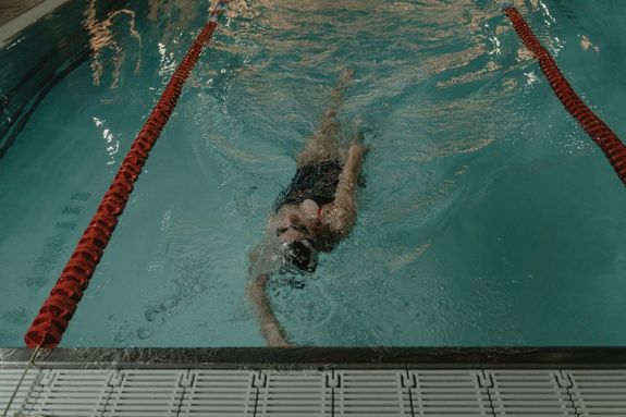 Swimmer Swimming in a Pool
