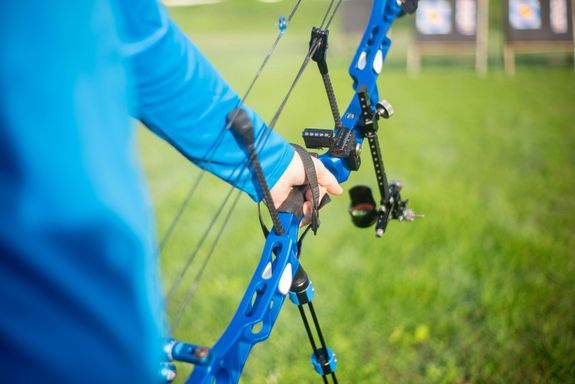 A Person Using a Compound Bow