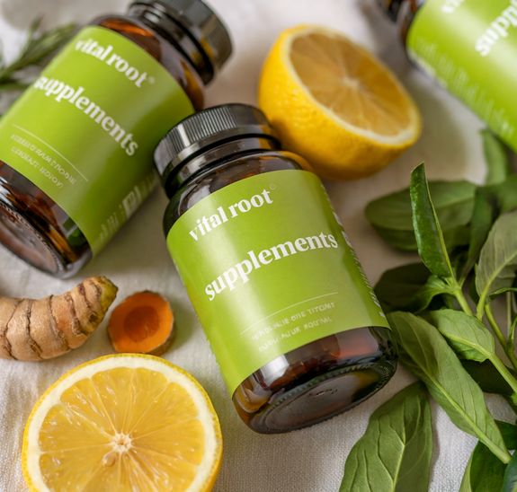 A Pink and Blue Medication Pills on White Surface