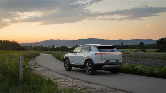 Aerial Photography of Blue Car on Road