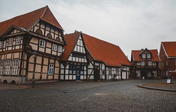 How can I determine if my commercial roof needs repairs or replacement?