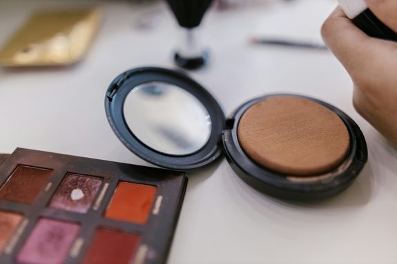 Close-up of Makeup Products on Table
