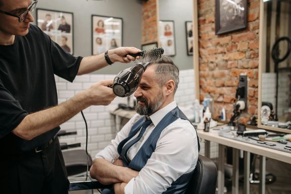 A Man Having a Haircut