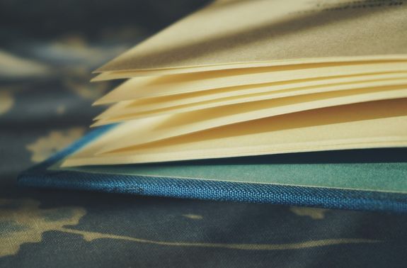 Yellow Pages of Book With Blue Cover