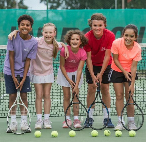 Tennis Ball on Tennis Racket on Floor