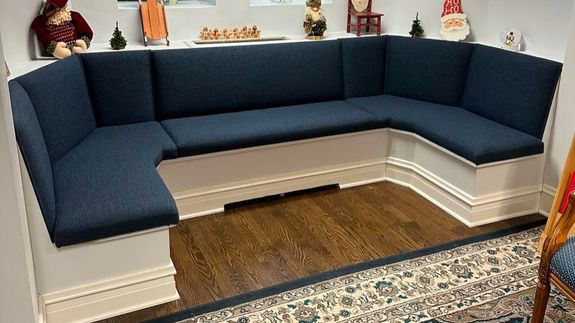 Cushion of black leather weathered sofa