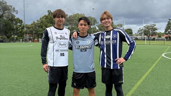 2 Football Player Running After Person Holding Football during Daytime in Shallow Focus Photography
