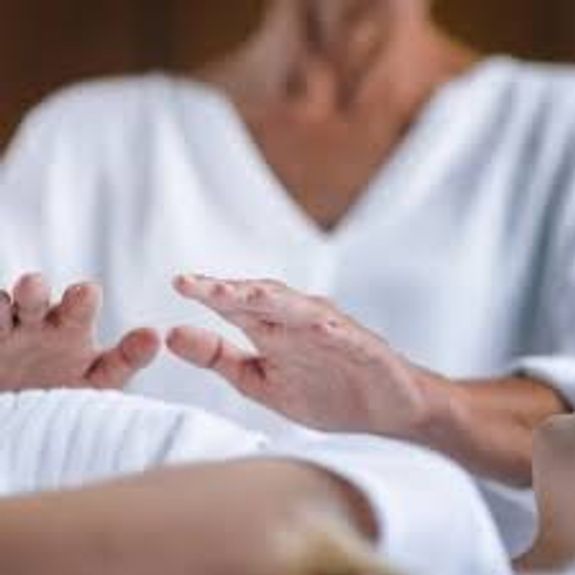 What is Reiki, and how does it support trauma healing?