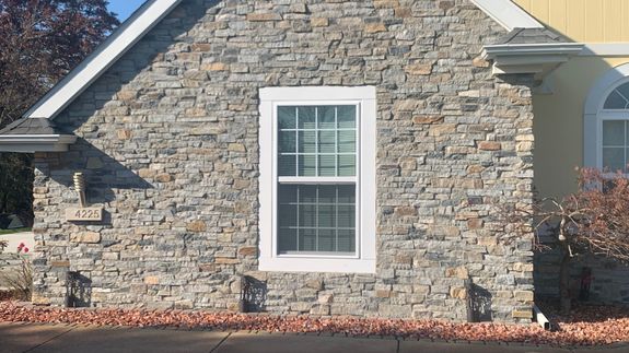 silver iMac near iPhone on brown wooden table