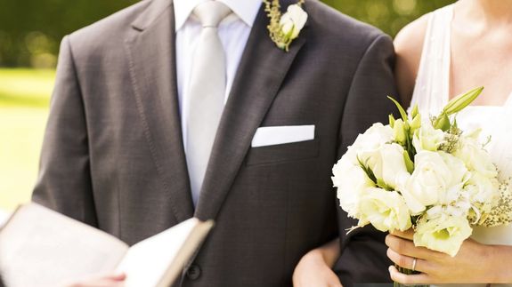 Table With Plates and Flowers Filed Neatly Selective Focus Photography