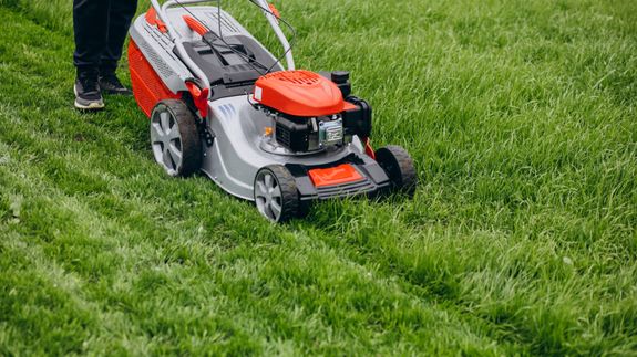 Man Putting Trash on the Truck 