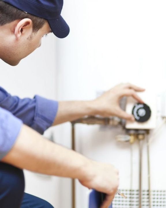 What should I expect during the hot water tank repair process?