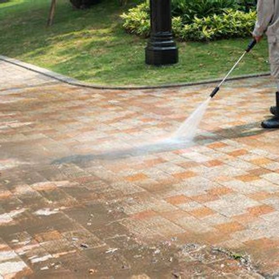 What types of surfaces can TP'z Pressure Washing clean?