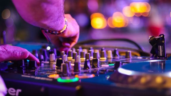Man Playing Pioneer Dj Turntable