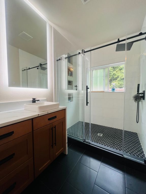 Silhouette of Man Holding Flamethrower