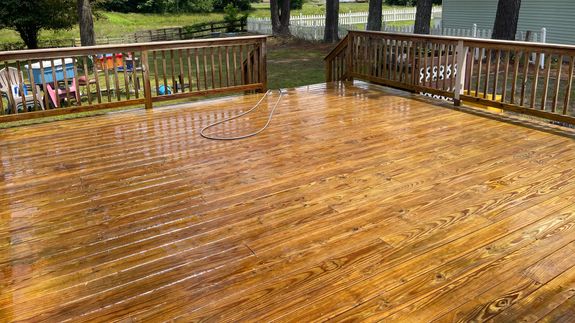 Man Cleaning Stairs on Street