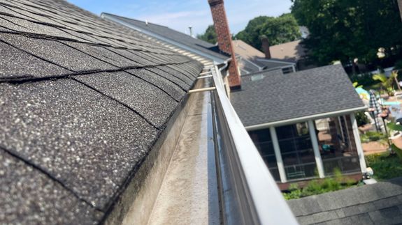 Concentrated man washing automobile at car wash