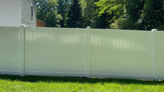 Man Cleaning Cobblestone Street