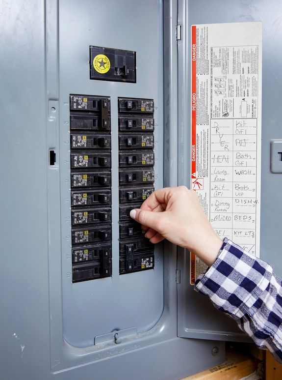 What should I do if I experience an electrical emergency?