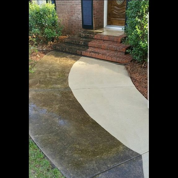 Is pressure washing safe for my plants and landscaping?