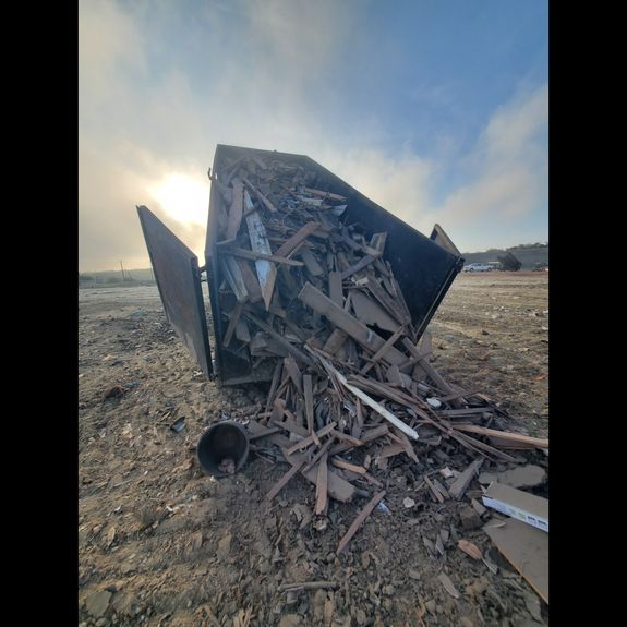 How do I schedule a dumpster rental for my construction site?