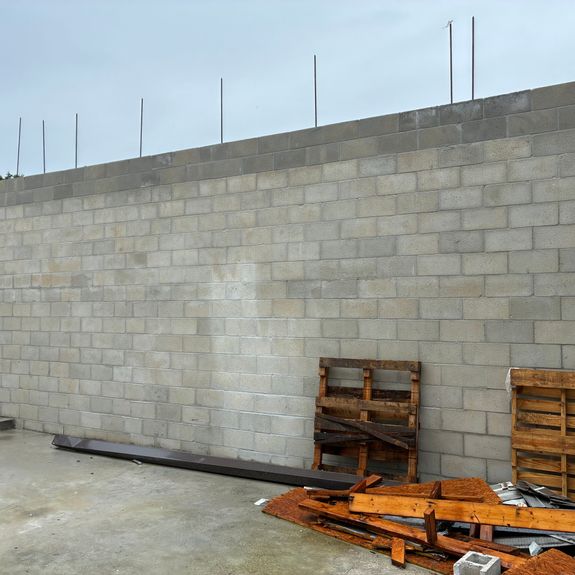 What are CMU walls and what benefits do they provide?