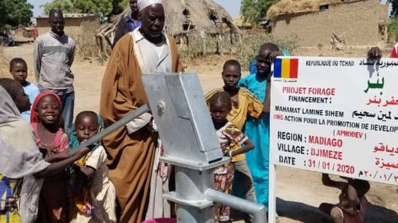 Formal man with tablet giving presentation in office