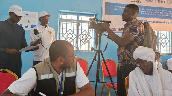 Woman in White Shirt Sitting on Chair
