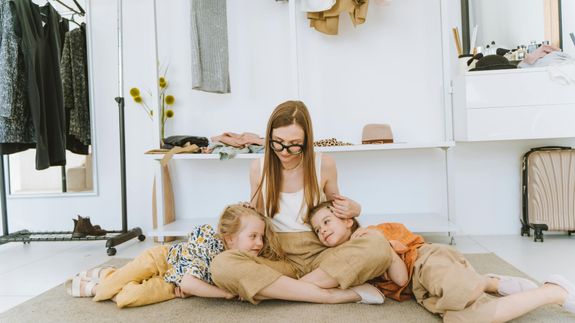 Person in Blue Gloves Cleaning White Sink