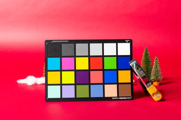 Man Drawing a Graph on Notebook