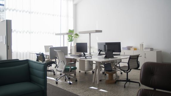 open sign hanging on physical storefront