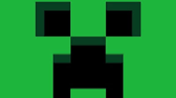 Two People holding Black Gaming Consoles