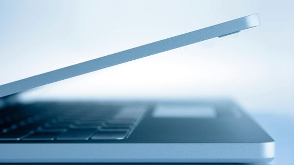 MacBook Pro on white surface