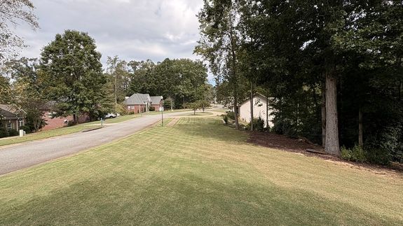 Brown Brick House Beside Trees
