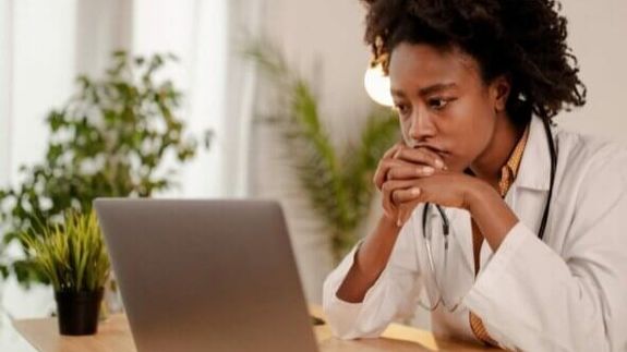 A Paramedic Opening an Ambulance Door