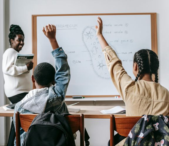 Teacher Asking a Question to the Class